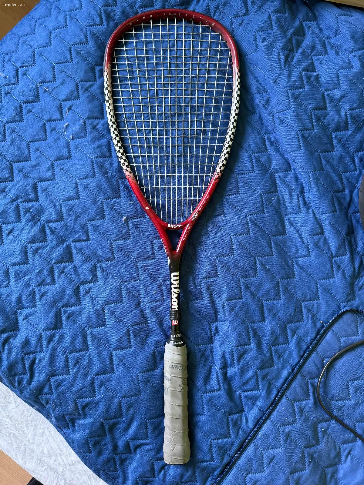 Squashová raketa Wilson za odvoz